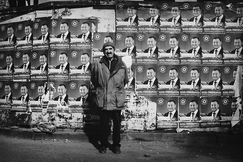Фотографія Pre-election posters and 90-year-old grandfather / Giorgi Dundua / photographers.ua