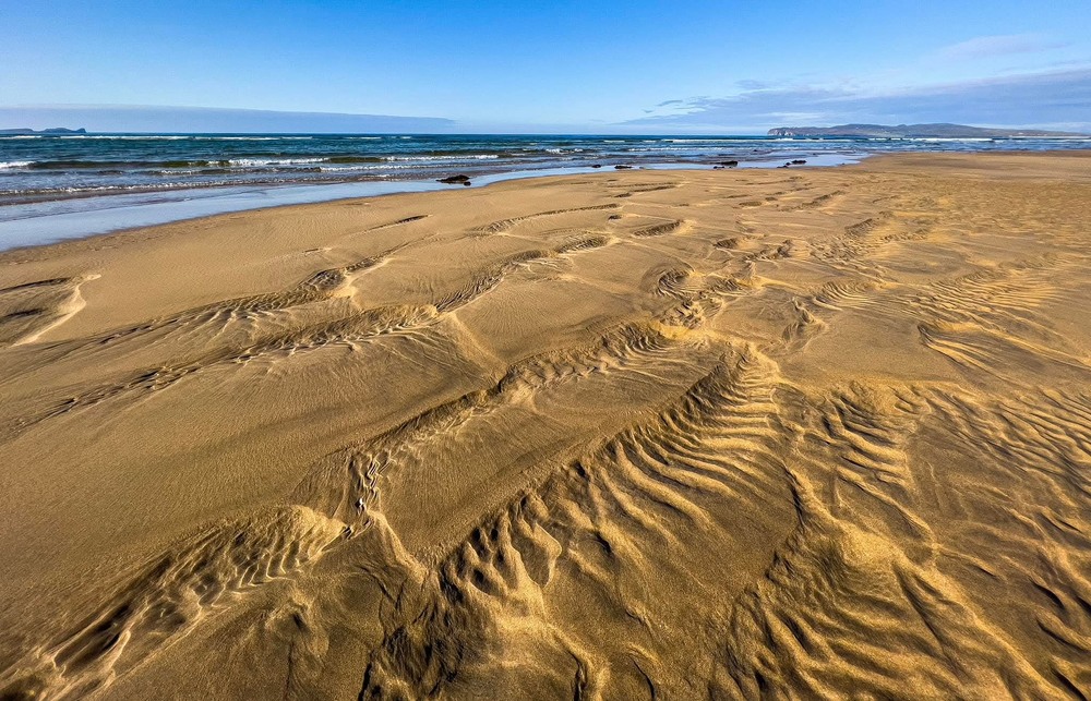 Фотографія The water draws patterns in the sand / D.S. / photographers.ua